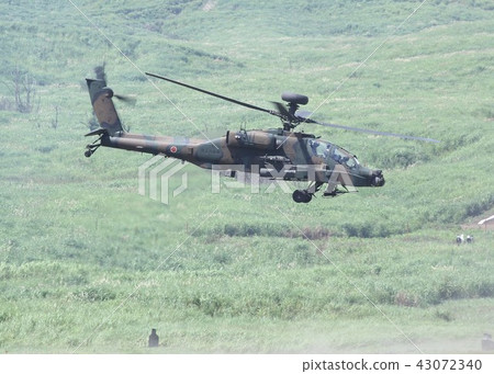 AH-64D Apache Battle helicopter of the Ground Self Defense Force who fly low field in the field of the East Fuji training ground 43072340