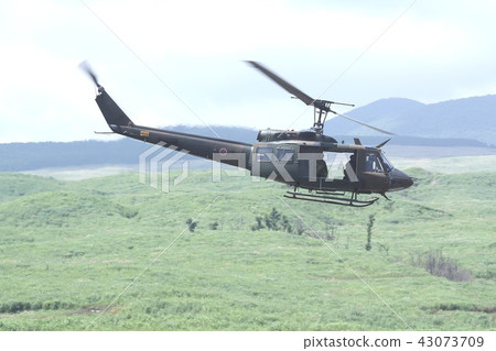UH-1J Irokois multi-use helicopter of the Ground Self Defense Force who is also active in disaster dispatch that fly at low altitude in the field of the East Fuji training ground UH-1J Irokois multi-use helicopter of the Ground Self Defense Force who is also active in disaster dispatch that fly at low altitude in the field of the East Fuji training ground 43073709