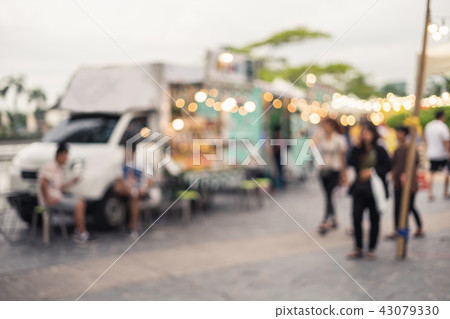 blurred image of people at food truck market 43079330