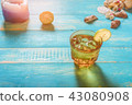 Drinks on the beach, lime soda on the table. Durin 43080908