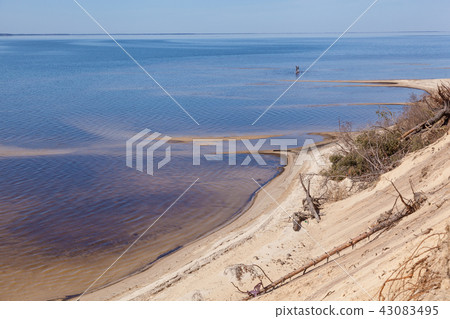 shoreline with a sandy shoreline with a sandy 43083495