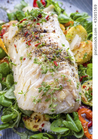 cod fish fillet with lettuce and vegetable cod fish fillet with lettuce and vegetable 43085569