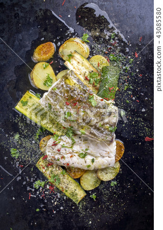 cod fish fillet with vegetable and potatoes cod fish fillet with vegetable and potatoes 43085580