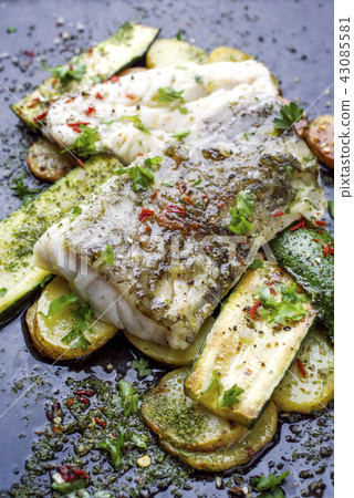 cod fish fillet with vegetable and potatoes 43085581