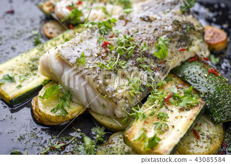 cod fish fillet with vegetable and potatoes cod fish fillet with vegetable and potatoes 43085584