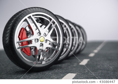Car wheel, car tire standing on a road. Concept tyres. Car tire with a disc standing on the asphalt 43086447