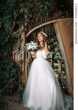 portrait of a beautiful young sexy girl bride  43089811