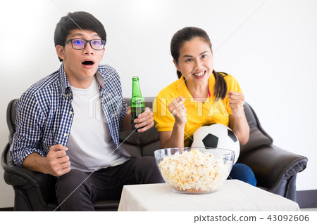Asian football supporters group of friend watching soccer sport 43092606