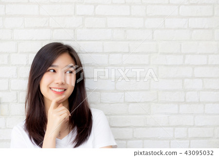 Beautiful portrait asian woman confident thinking 43095032