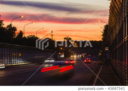 Summer landscape with highway and tracks from car headlights 43097341