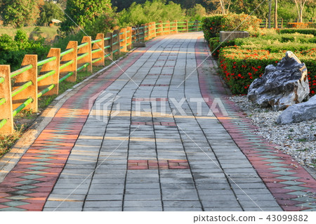 Stone block walk path in the park  43099882