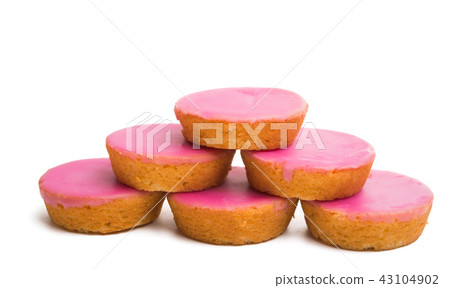 Dutch biscuit in pink glaze isolated Dutch biscuit in pink glaze isolated 43104902