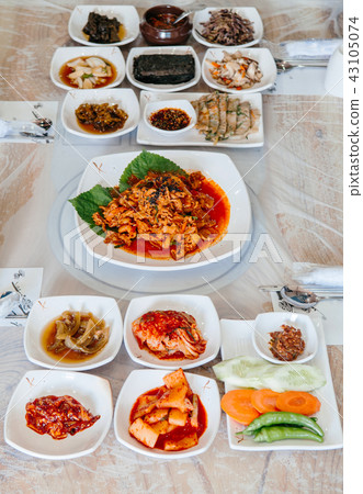 Kimchi pork, Pajeon Korean pancake and side dishes 43105074