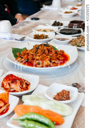 Kimchi pork, Pajeon Korean pancake and side dishes 43105075