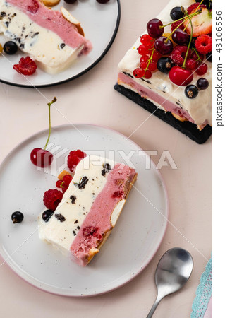 Vanilla and berries ice cream loaf cake, selective focus. Semifredo. 43106556