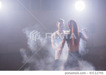 Young love couple dancing social danse kizomba or bachata. Young love couple dancing social danse kizomba or bachata. 43112745
