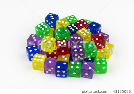 A stack of colorful, translucent game dice 43125096