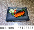 Grilled salmon with vegetables 43127523