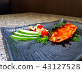 Grilled salmon with vegetables 43127528