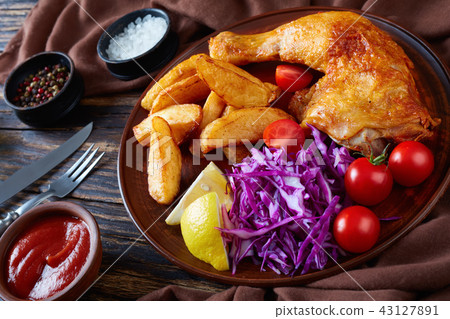 fried chicken leg, potato and salad, close-up fried chicken leg, potato and salad, close-up 43127891