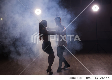 Young love couple dancing social danse kizomba or bachata. Young love couple dancing social danse kizomba or bachata. 43128466