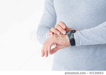 fitness tracker gadget man checking hand watch fitness tracker gadget man checking hand watch 43130053