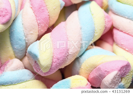 Background of twisted, colorful marshmallow Background of twisted, colorful marshmallow 43131269