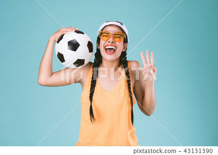 sport woman holding a soccer ball 43131390