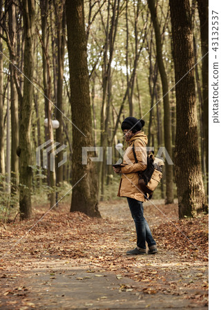 Hipster girl in a park Hipster girl in a park 43132537