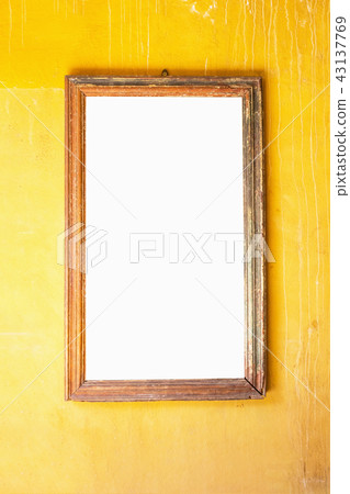 Picture frame on the wall of orange 43137769