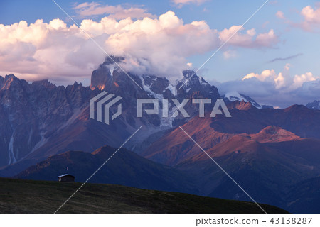 Mount Ushba in clouds Mount Ushba in clouds 43138287