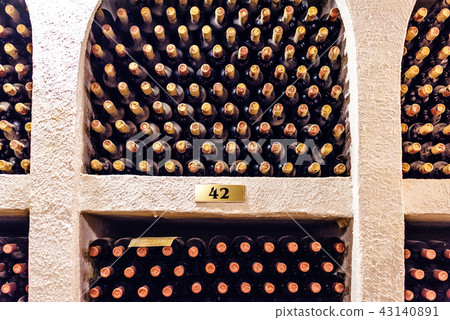 Famous wine cellars racks in wide perspective Famous wine cellars racks in wide perspective 43140891