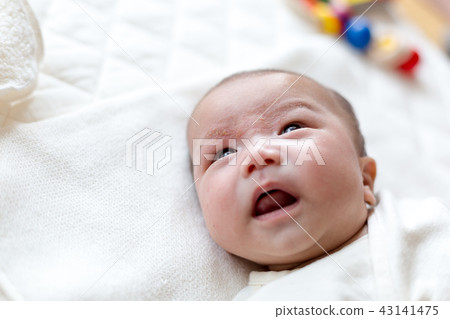 Smiling newborn baby Smiling newborn baby 43141475