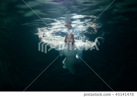 Beautiful woman under the water. Beautiful woman under the water. 43141478
