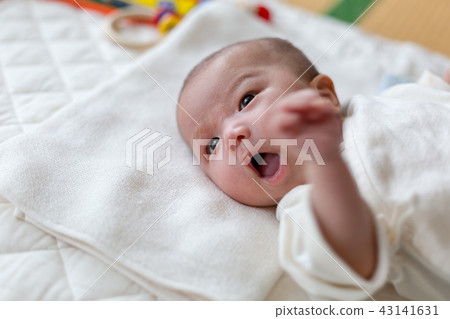 Smiling newborn baby Smiling newborn baby 43141631