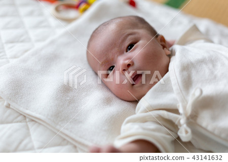 Smiling newborn baby Smiling newborn baby 43141632