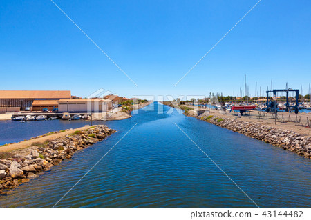 Waterway with harbor and shipyard by Gruissan Waterway with harbor and shipyard by Gruissan 43144482