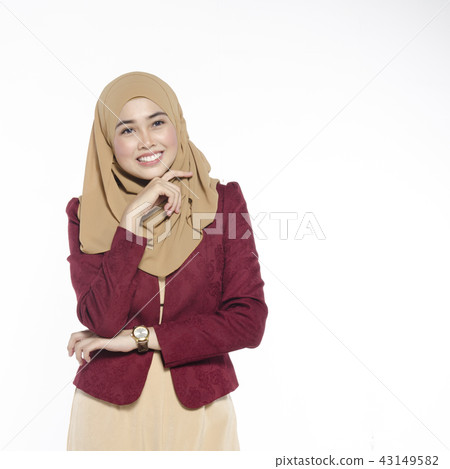 Happy expression of young attractive muslimah Happy expression of young attractive muslimah 43149582