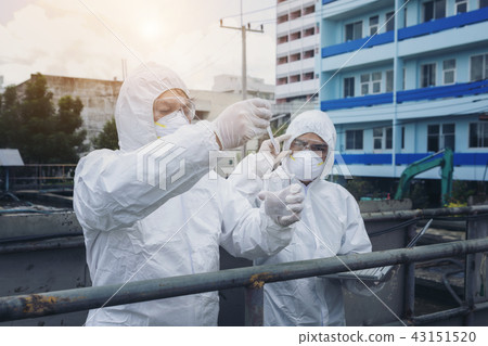 Scientists are examining the quality waste water Scientists are examining the quality waste water 43151520