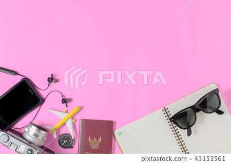 accessories for travel on pink background,  43151561