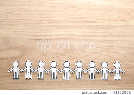 Teamwork silhouettes of people holding hands Teamwork silhouettes of people holding hands 43152938