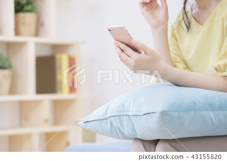 Woman operating a smartphone Body parts Parts cut Faceless Woman operating a smartphone Body parts Parts cut Faceless 43155820