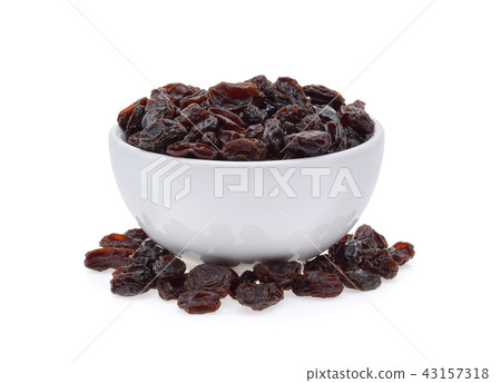 Dried raisins in bowl isolated on white 43157318