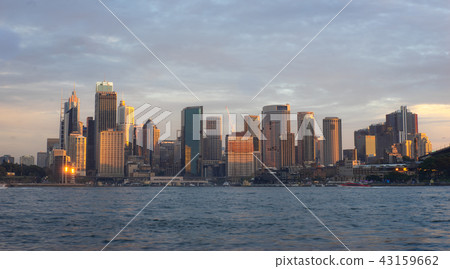 Buildings in city of Sydney during sunset time Buildings in city of Sydney during sunset time 43159662
