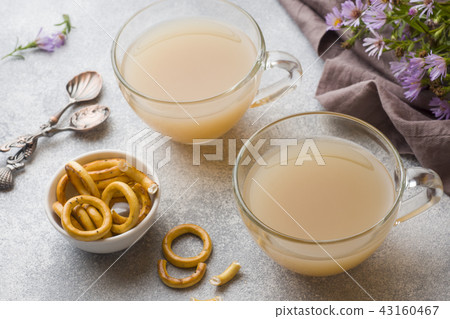 Cup of coffee with milk and crackers Cup of coffee with milk and crackers 43160467