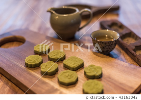 green mooncake on table green mooncake on table 43163042