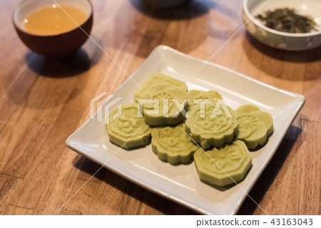 green mooncake on table green mooncake on table 43163043