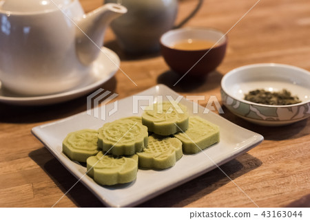 green mooncake on table green mooncake on table 43163044
