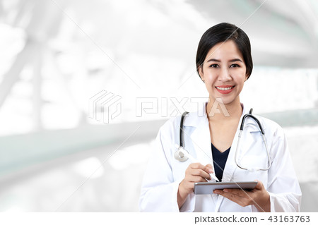 Portrait of young attractive female asian doctor 43163763