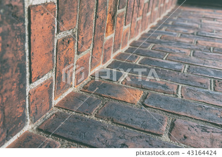 Brick wall of an old house 43164424